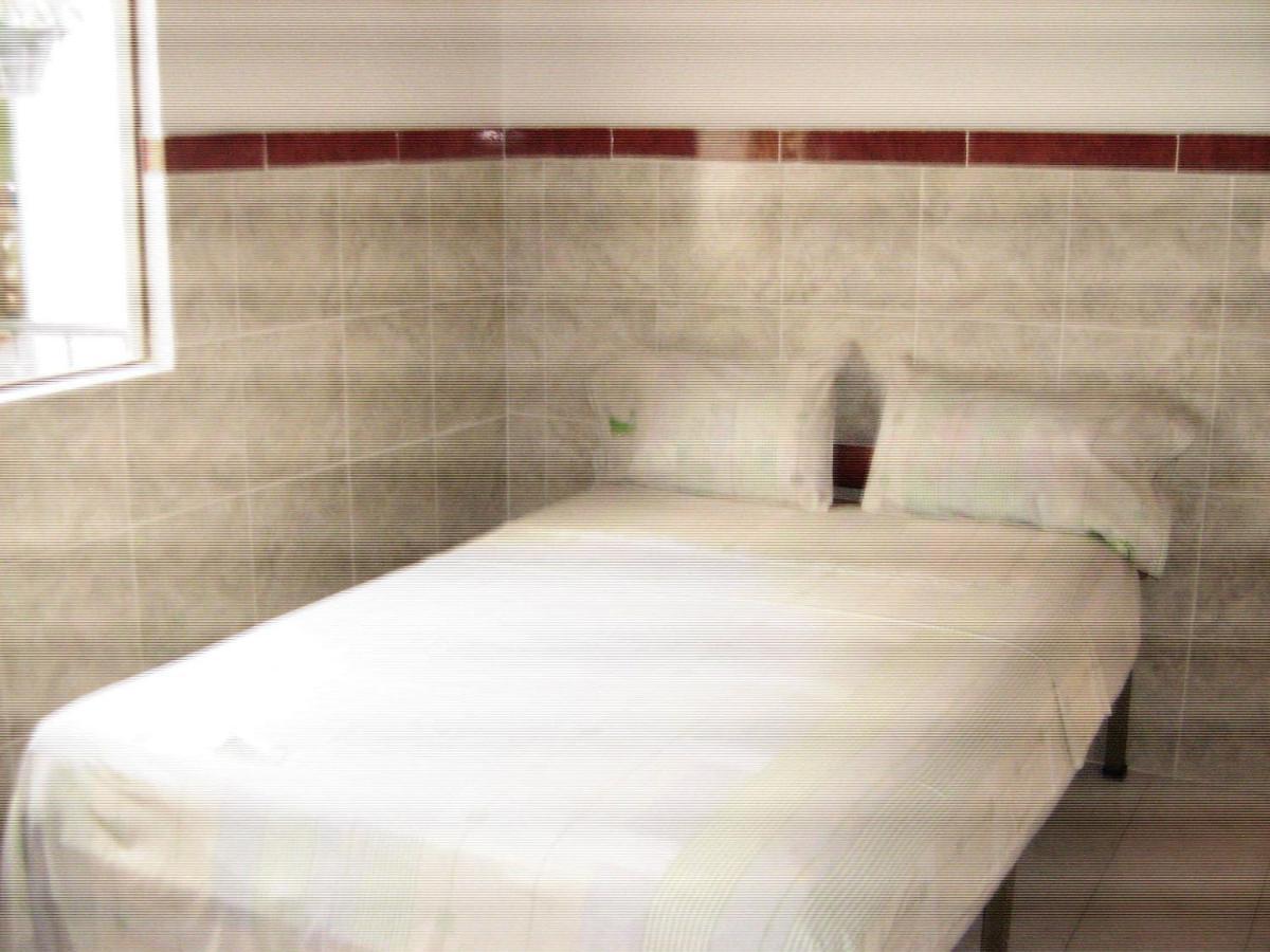 Hotel Arpa De Aguas Villavicencio Rum bild